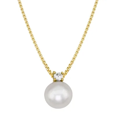 Gargantilla en oro amarillo de 18 Kilates, con perla central de 7 mm de ancho aprox y decoración en zircón, 43 cm. de largo, 0.50 mm. de ancho