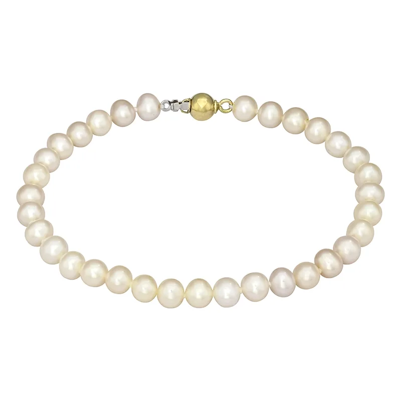 Pulsera con perlas de 5 mm de ancho aprox con broche en oro amarillo de 18 Kilates, 19 cm. de largo