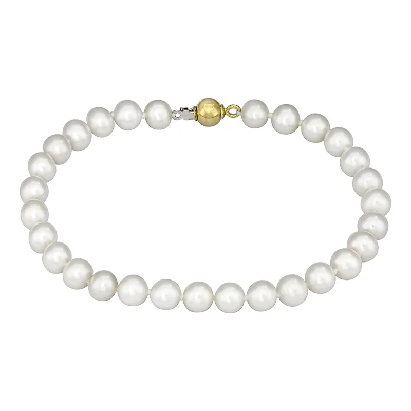 Pulsera con perlas de 6 mm de ancho aprox con broche en oro amarillo de 18 Kilates, 19 cm. de largo