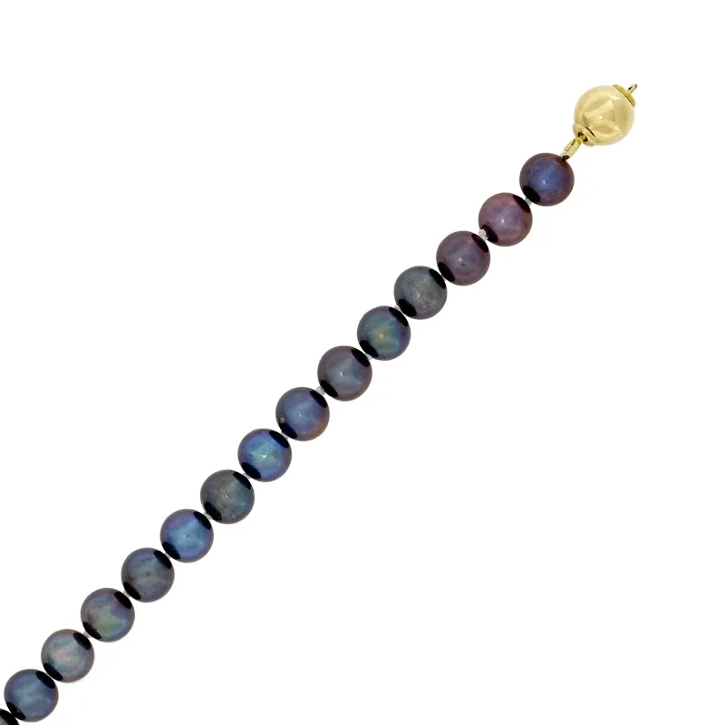 Pulsera con perlas de 7 mm de ancho aprox con broche en oro amarillo de 18 Kilates, 19 cm. de largo