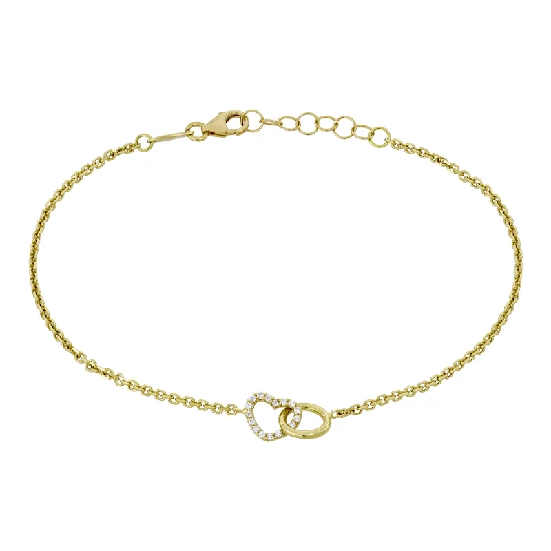Pulsera de corazón en oro amarillo de 18 Kilates, con zircones