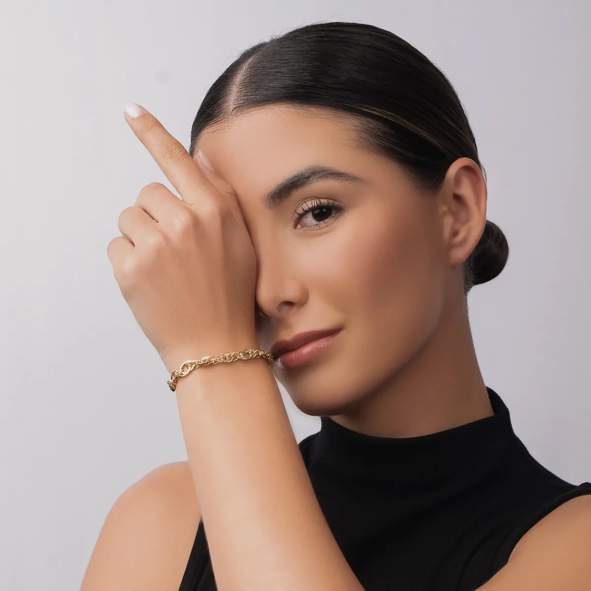 Pulsera en oro amarillo de 18 Kilates con visos, 19 cm. de largo, 5 mm. de ancho