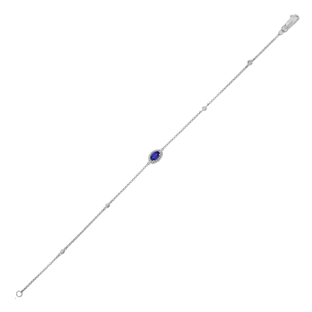 Pulsera en oro blanco de 18 Kilates, con zafiro laboratorio central de 0.30 Ct y decoración en diamante de laboratorio de 0.08 Ct, 18 cm. de largo, 1 mm. de ancho