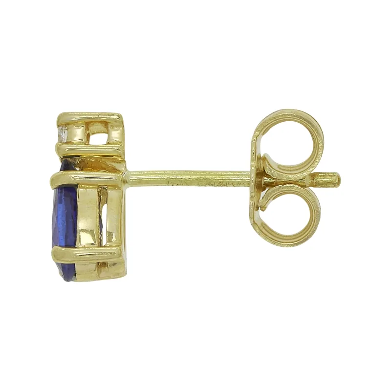 Topos en oro amarillo de 18 Kilates, con 2 zafiros centrales de 1.00 Ct y decoración en diamantes de 0.04 Ct