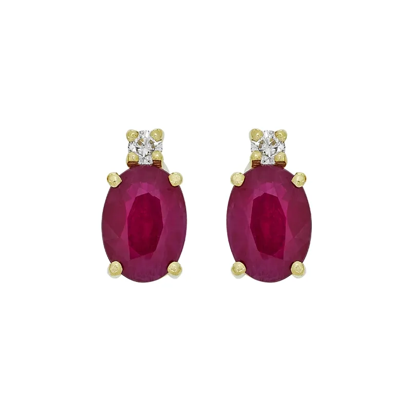 Topos en oro amarillo de 18 Kilates, con 2 rubís centrales de 1.50 Ct y decoración en diamantes de 0.06 Ct