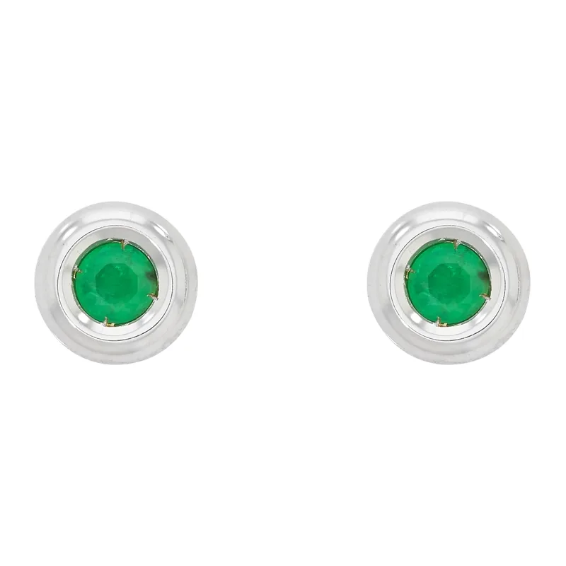 Topos studs en oro blanco de 18 Kilates, Bisel, con 2 esmeraldas centrales de 0.36 Ct, 7 mm. de ancho