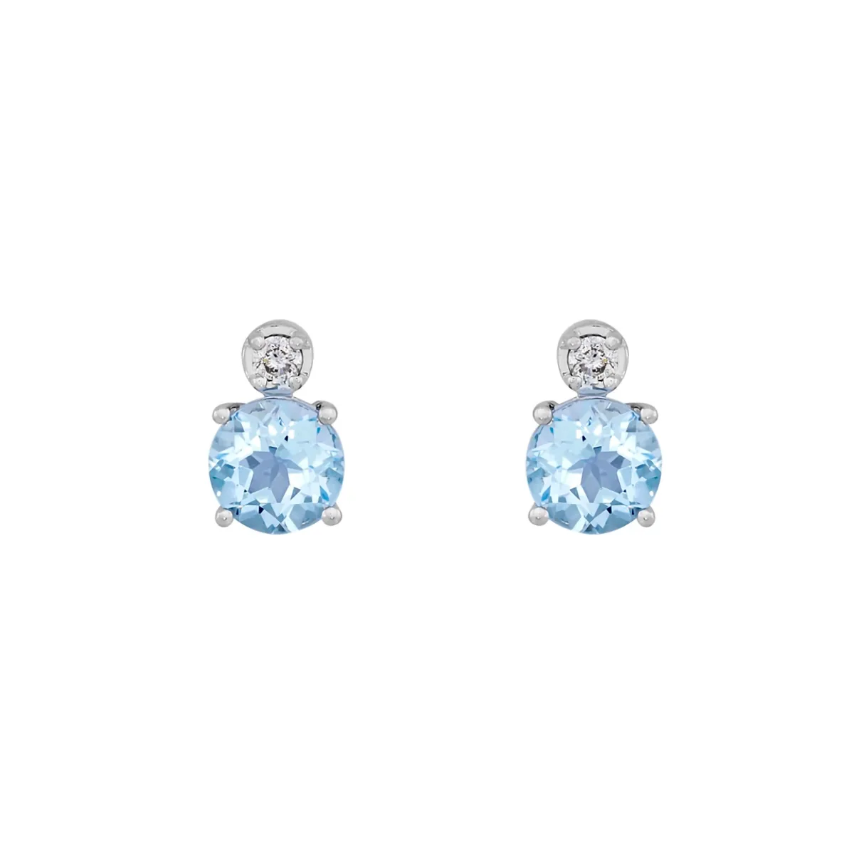 Topos en oro blanco de 18 Kilates, Uñas+decoración, con 2 topacios centrales de 1.25 Ct y decoración en diamantes de 0.05 Ct