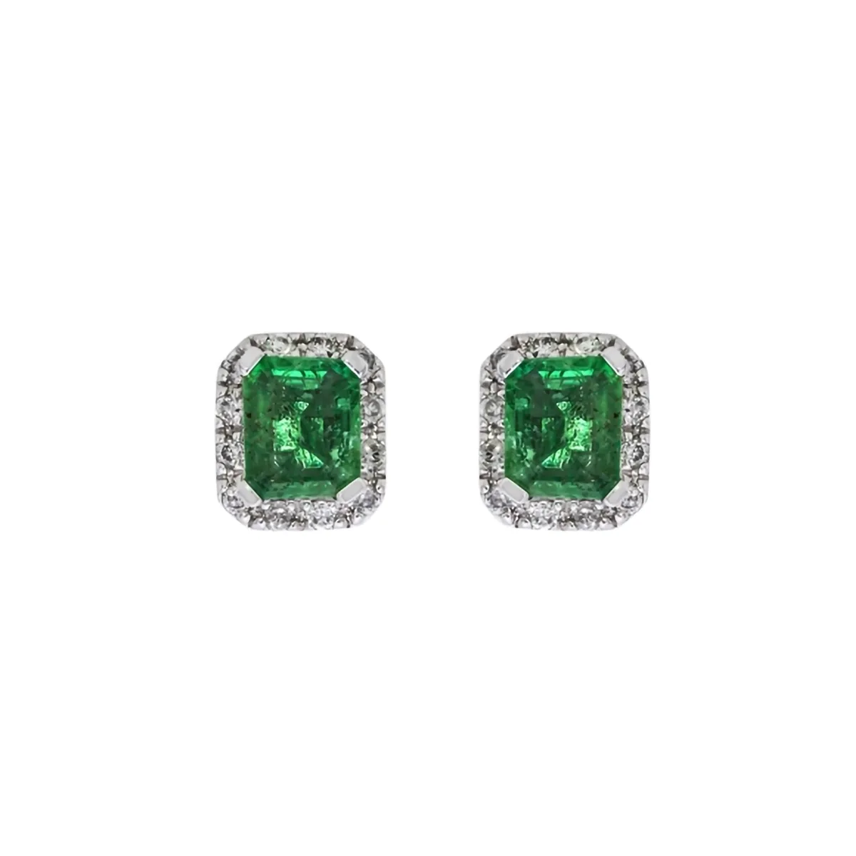 Topos en oro blanco de 18 Kilates, Uñas+decoración, con 2 esmeraldas centrales de 0.90 Ct y decoración en diamantes de 0.16 Ct