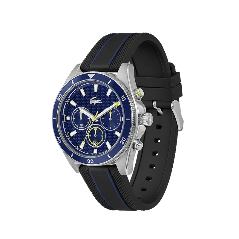 Reloj Lacoste analogo, para Hombre, tablero redondo colores azul y dorado, estilo index, pulso silicona colores negro y azul, calendario, cronografo