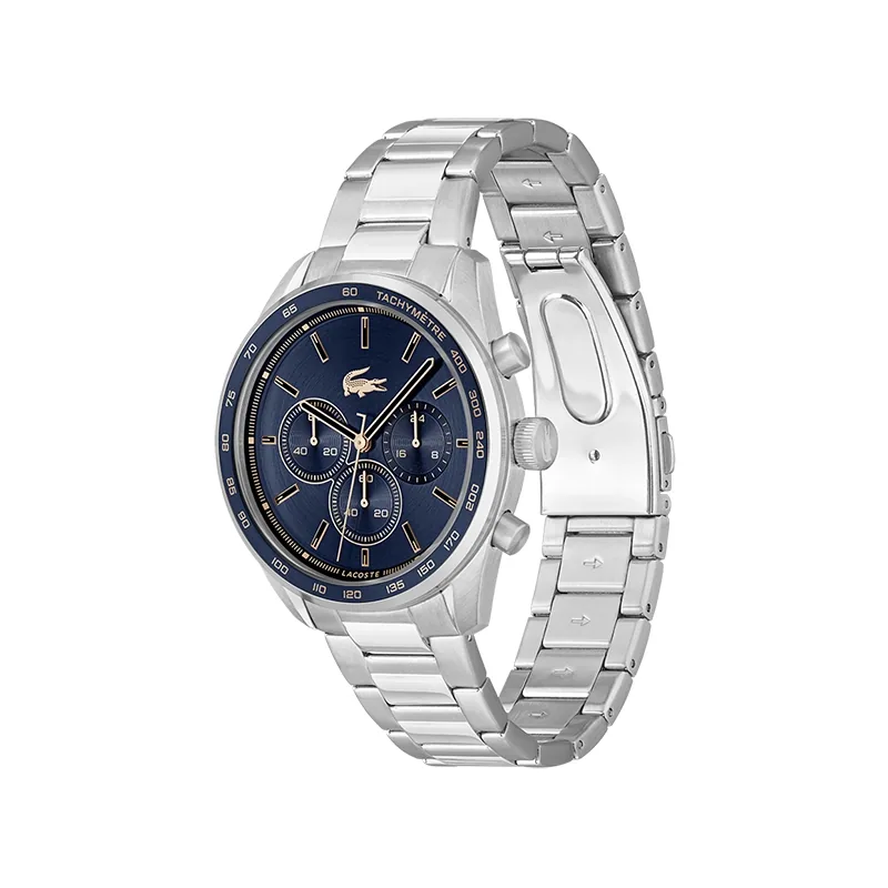 Reloj Lacoste analogo, para Hombre, tablero redondo colores azul y rosa, estilo index, pulso acero color plateado, cronografo