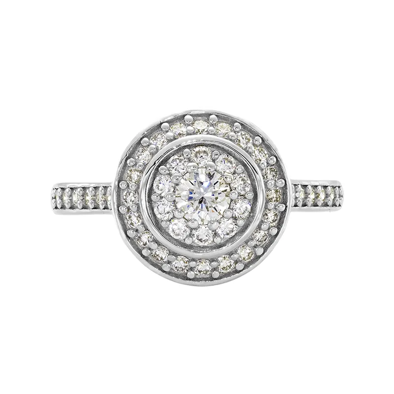 Anillo de compromiso halo redondo, con diamante de laboratorio con un peso total de 0.60Ct, en plata ley 925, rodinado - Colección Sueños