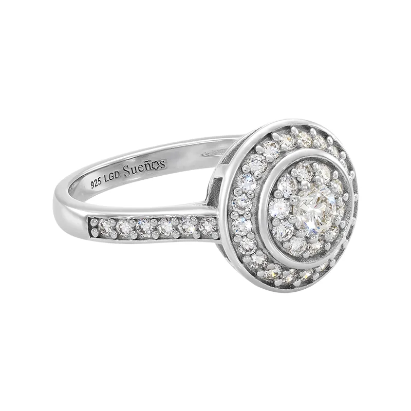 Anillo de compromiso halo redondo, con diamante de laboratorio con un peso total de 0.60Ct, en plata ley 925, rodinado - Colección Sueños