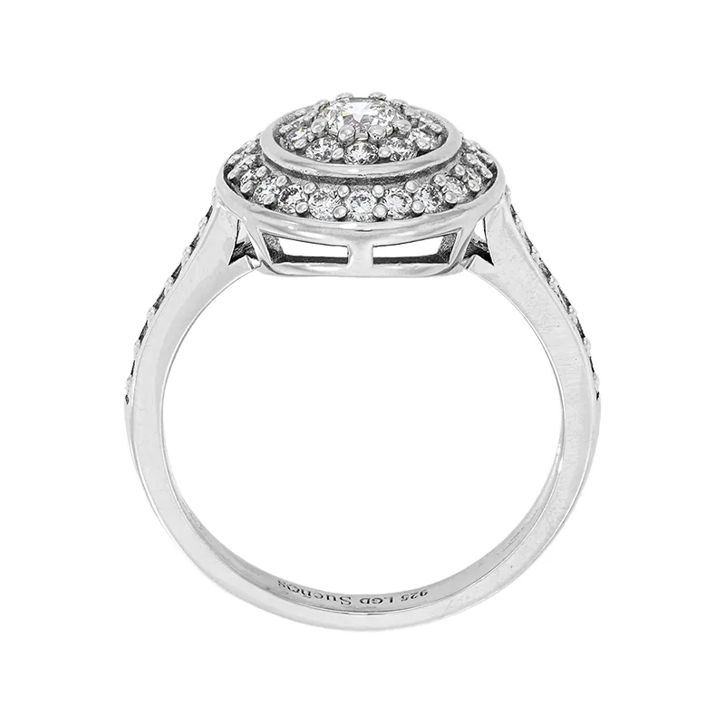 Anillo de compromiso halo redondo, con diamante de laboratorio con un peso total de 0.60Ct, en plata ley 925, rodinado - Colección Sueños