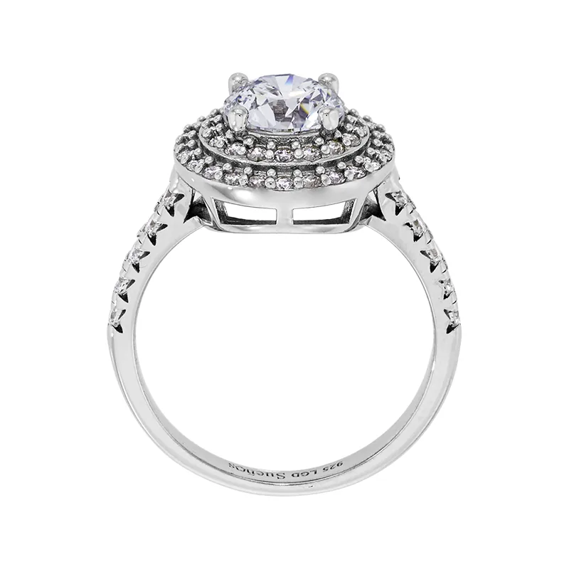 Anillo de compromiso halo doble, con diamante de laboratorio central redondo de 1.00Ct y decoración en diamantes de laboratorio, en plata ley 925, rodinado - Colección Sueños