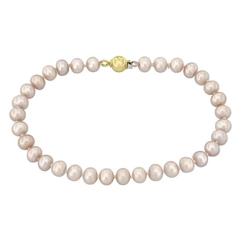 Pulsera con perlas de 5 mm de ancho aprox con broche en oro amarillo de 18 Kilates, 19 cm. de largo