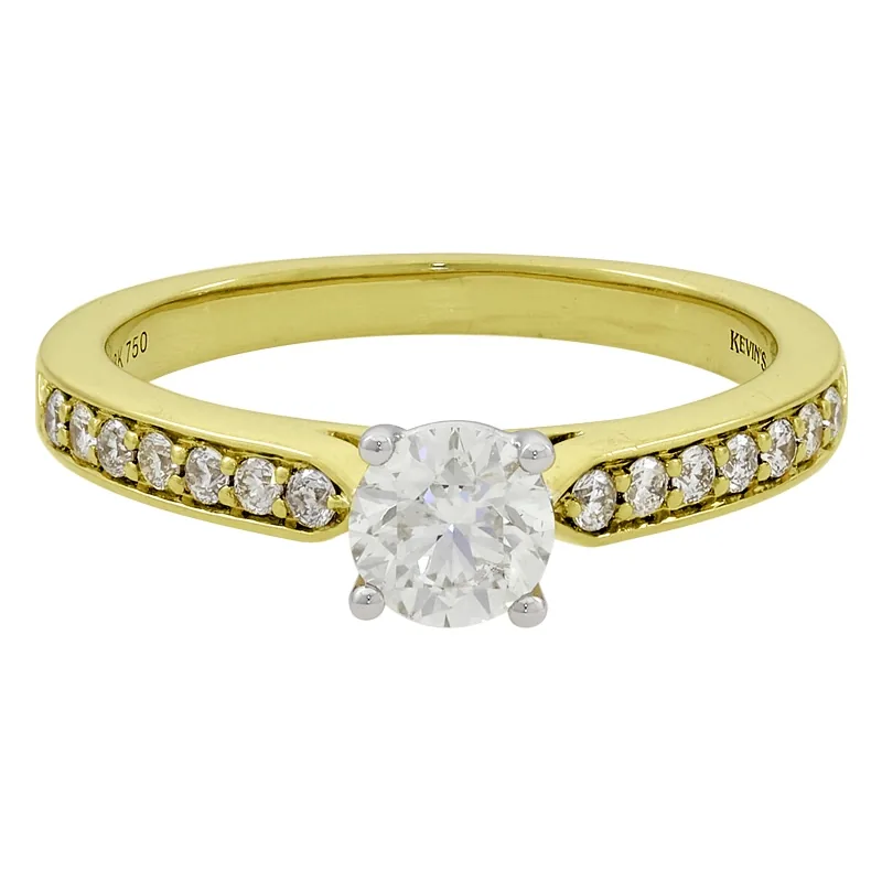 Anillo de compromiso con diamante central redondo GIA de 0.50ct y decoración en diamantes, oro 2 tonos 18k, rodinado