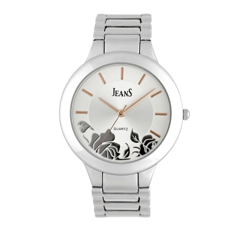 Reloj Jeans analogo, para Dama, tablero redondo colores plateado y rosa, estilo index, pulso metalico color plateado