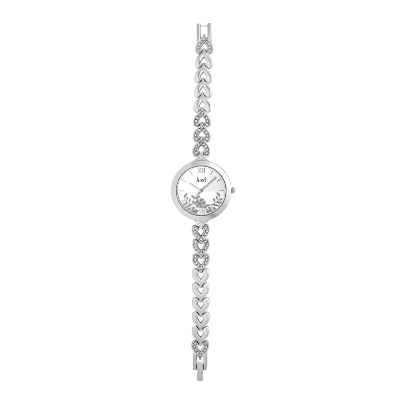 Reloj Jeans analogo, para Dama, tablero redondo color plateado, estilo index + romano, pulso metalico color plateado
