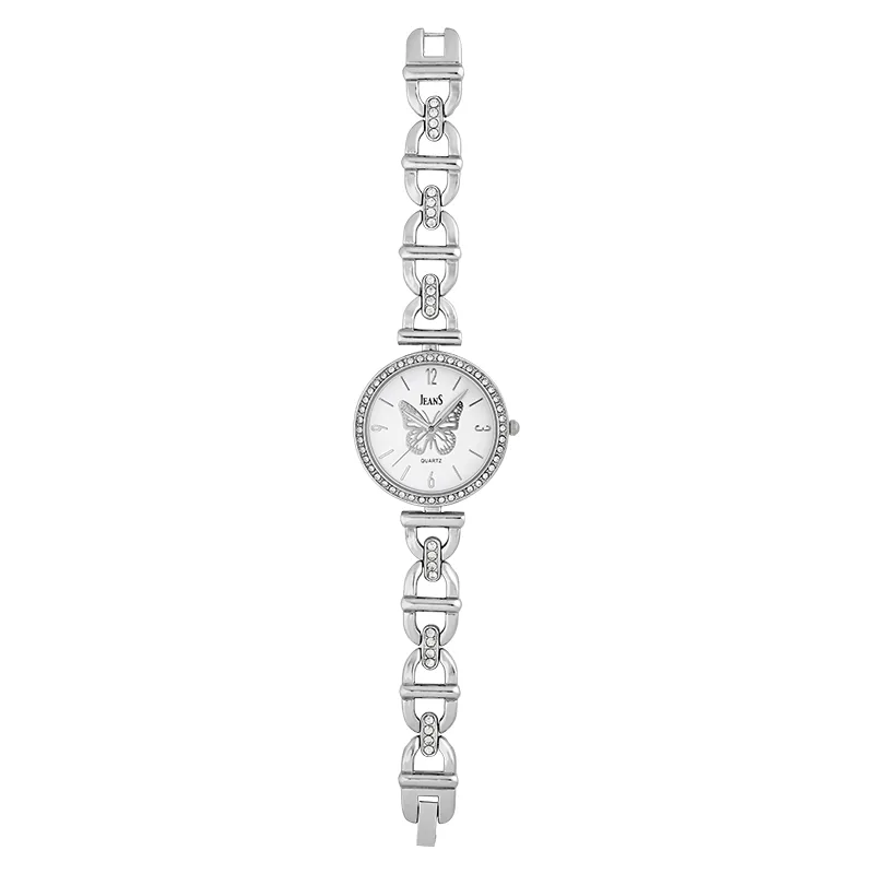 Reloj Jeans analogo, para Dama, tablero redondo color blanco, estilo index + arabigo, pulso metalico color plateado