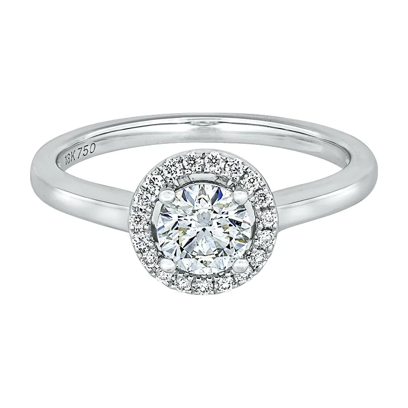 Anillo de compromiso halo redondo, con diamante central redondo GIA de 0.50ct y decoración en diamantes, oro tono blanco 18k, rodinado