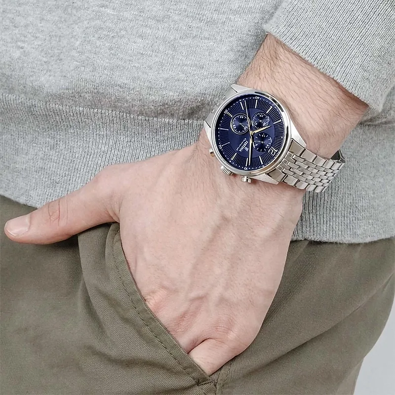 Reloj Festina análogo, para Hombre, tablero redondo color azul, estilo index + arábigo, pulso acero color plateado, cronografo