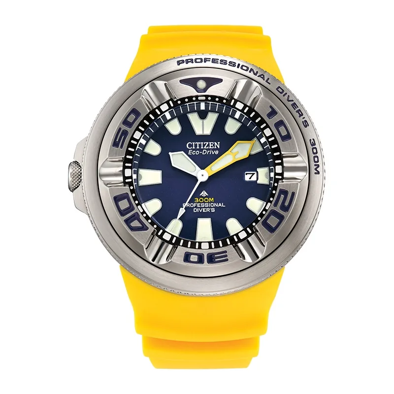 Reloj Citizen analogo, para Hombre, tablero redondo colores azul y blanco, estilo index, pulso silicona color amarillo, calendario