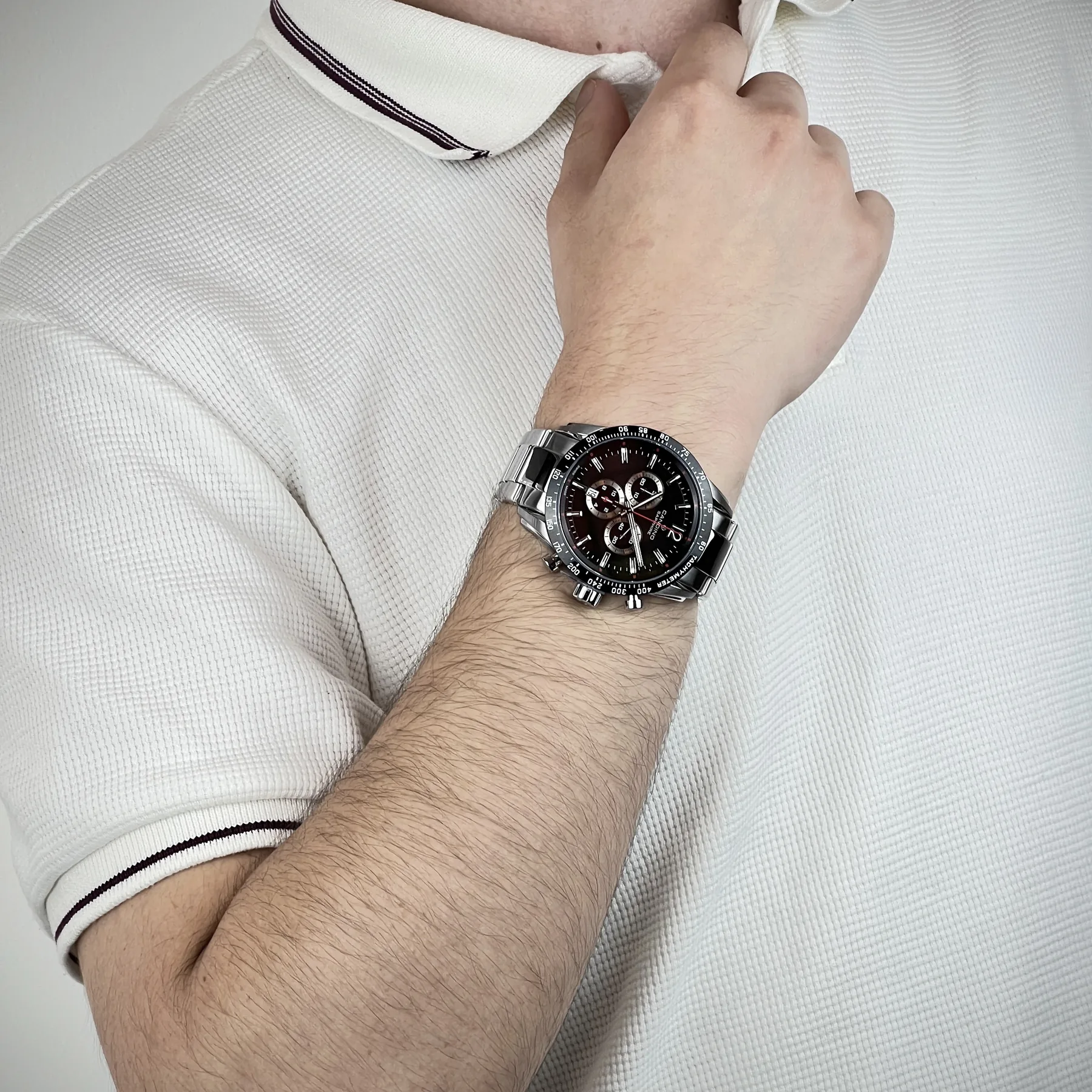 Reloj Candino analogo, para Hombre, tablero redondo colores negro y plateado, estilo index + arabigo, pulso acero color plateado, calendario, cronografo