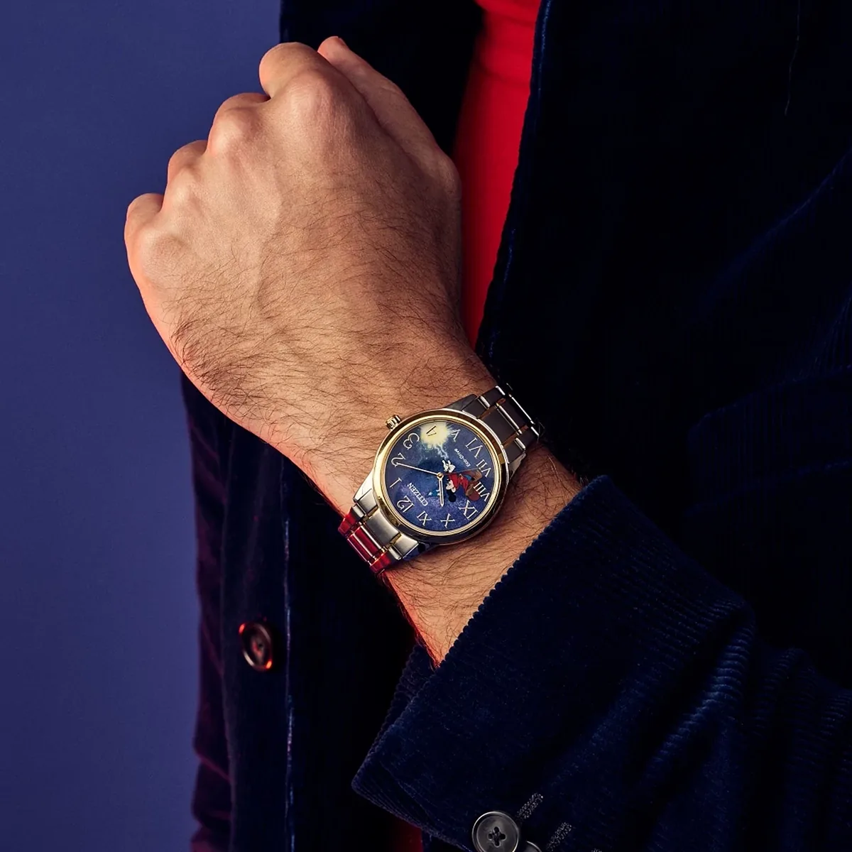 Reloj Citizen análogo, para Hombre, tablero redondo color azul, estilo arábigos + romanos, pulso acero colores plateado y dorado