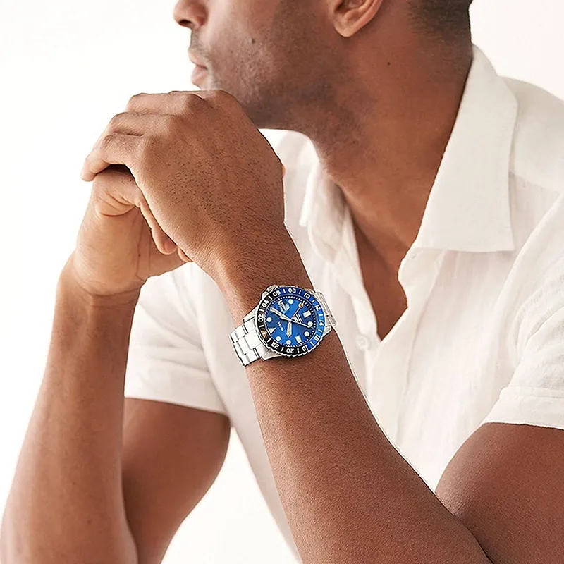 Reloj Fossil analogo, para Hombre, tablero redondo color azul, estilo index + puntos, pulso acero color plateado, calendario