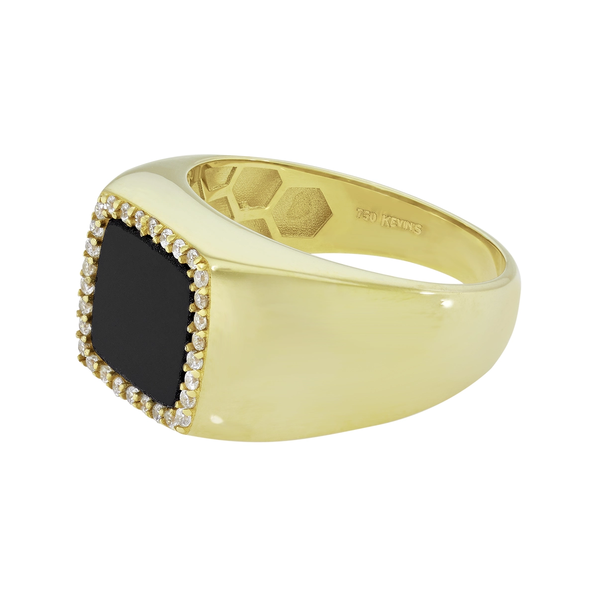 Anillo en oro amarillo de 18 Kilates, con ónix central y decoración en zircones