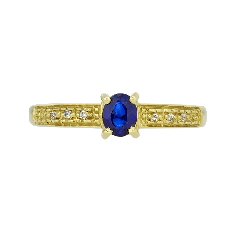 Anillo en oro amarillo de 18 Kilates, con zafiro central de 0.47 Ct y decoración en diamantes de 0.05 Ct
