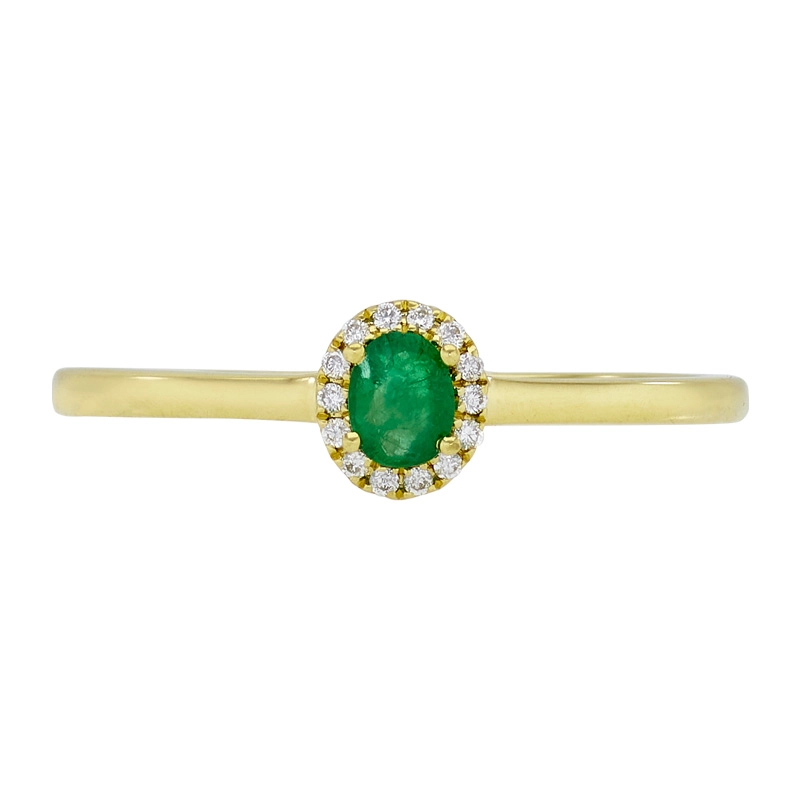 Anillo en oro amarillo de 18 Kilates, con esmeralda central de 0.16 Ct y decoración en diamantes de 0.04 Ct