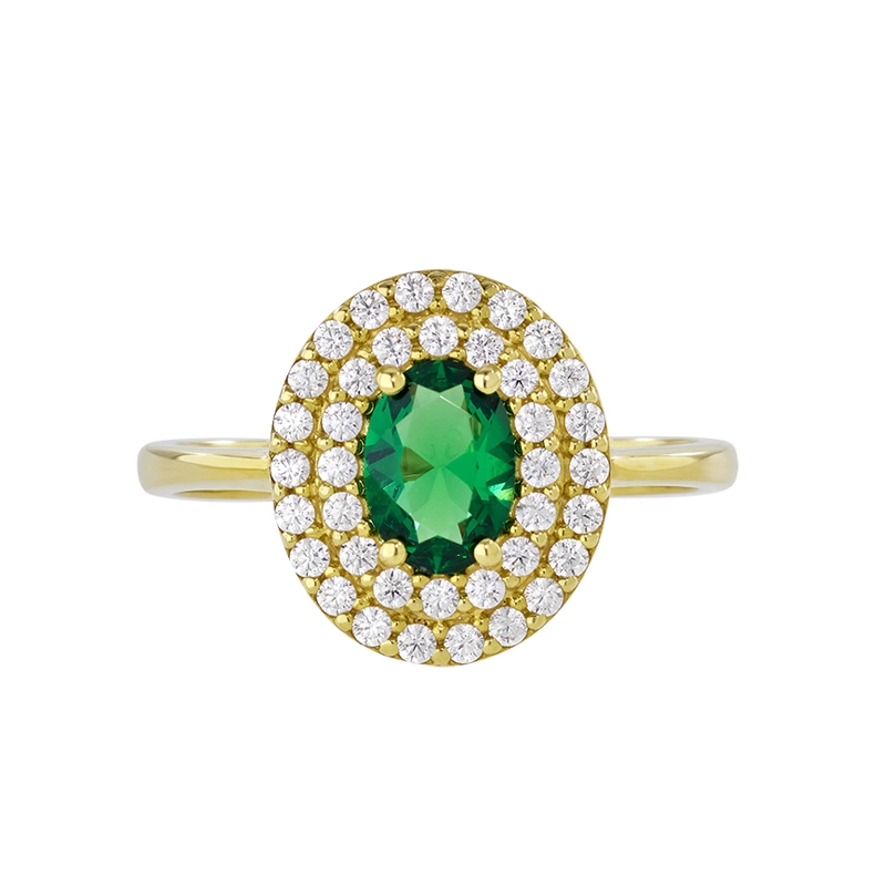 Anillo en oro amarillo de 18 Kilates, con zircón col central y decoración en zircones