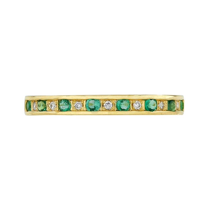 Anillo en oro amarillo de 18 Kilates, con esmeraldas de 0.15 Ct y diamantes de 0.04 Ct