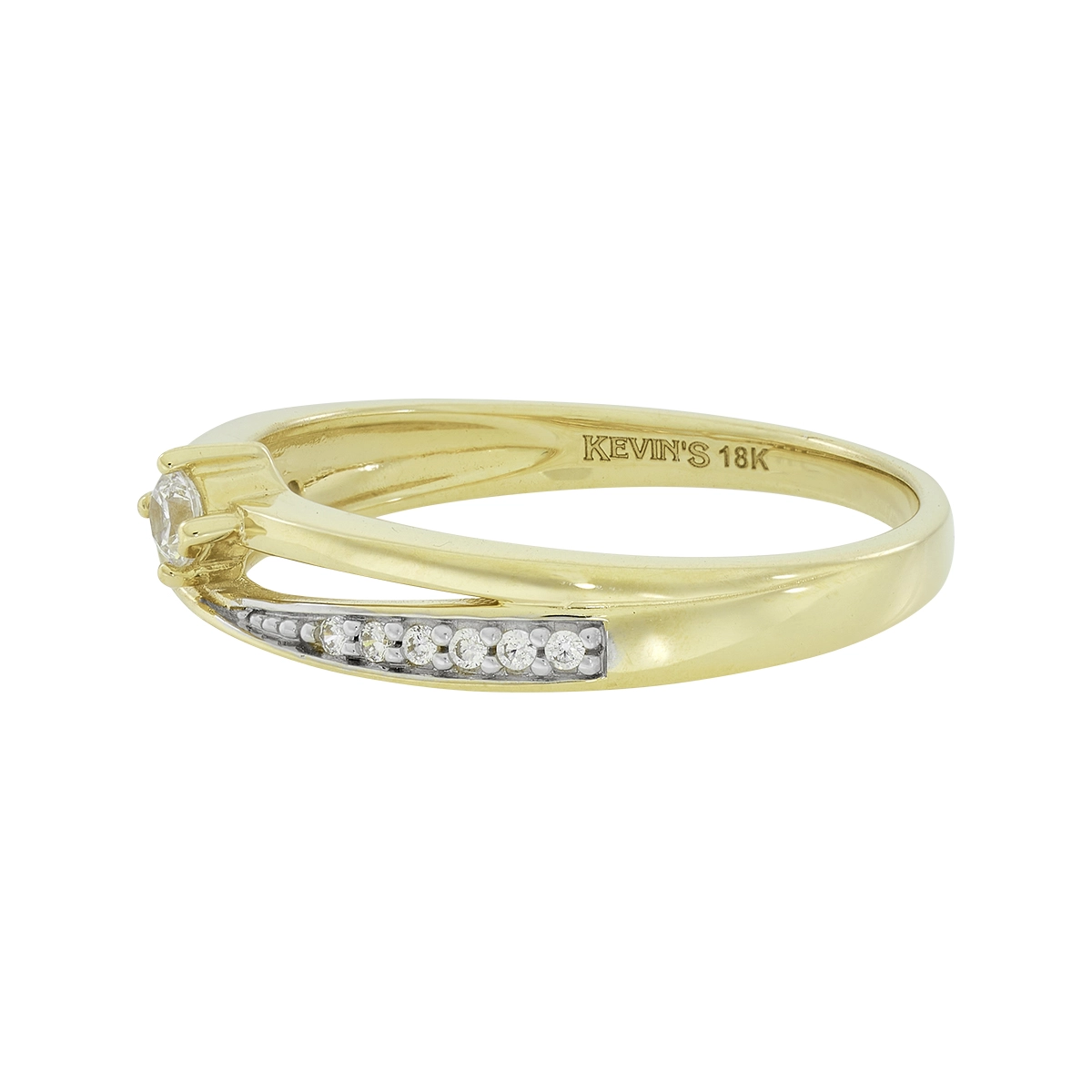 Anillo en oro amarillo de 18 Kilates, con zircón central y decoración en zircones