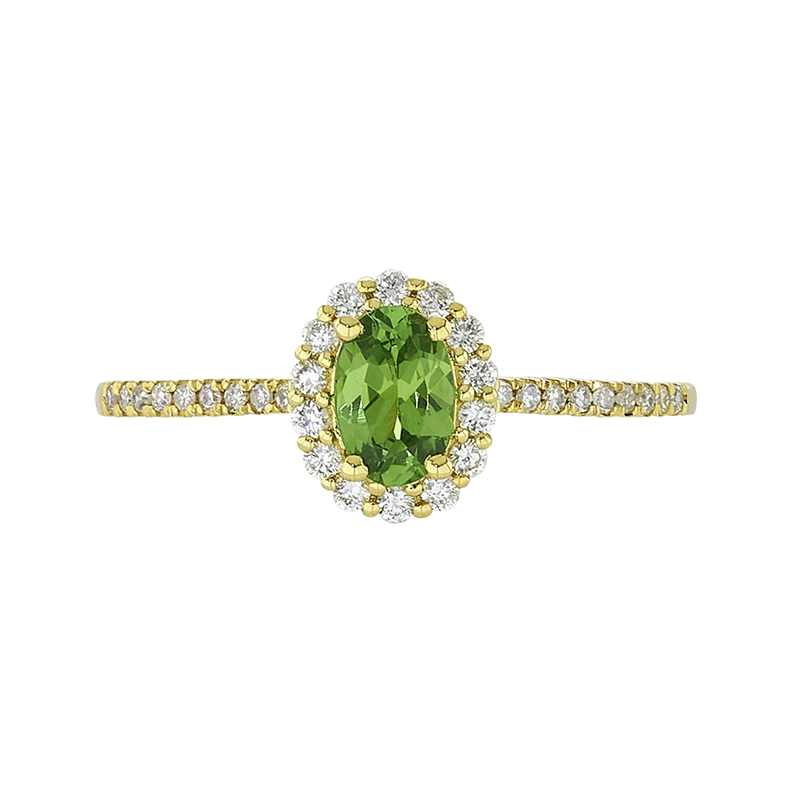 Anillo en oro amarillo de 18 Kilates, con granate central y decoración en diamantes de 0.21 Ct