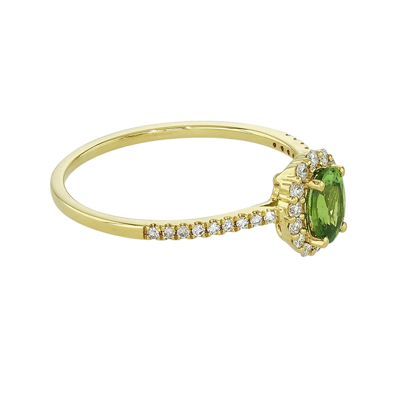 Anillo en oro amarillo de 18 Kilates, con granate central y decoración en diamantes de 0.21 Ct