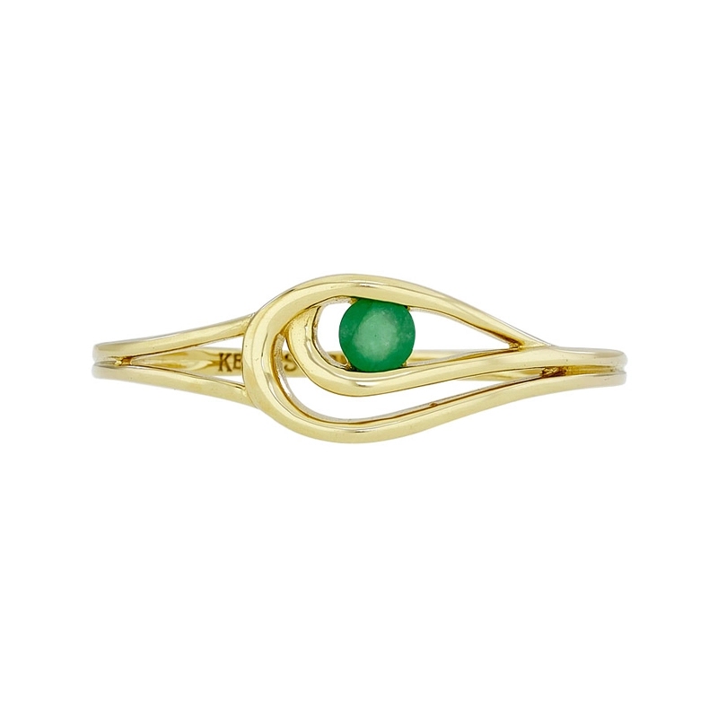 Anillo en oro amarillo de 18 Kilates, con esmeralda central