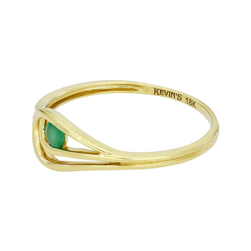 Anillo en oro amarillo de 18 Kilates, con esmeralda central