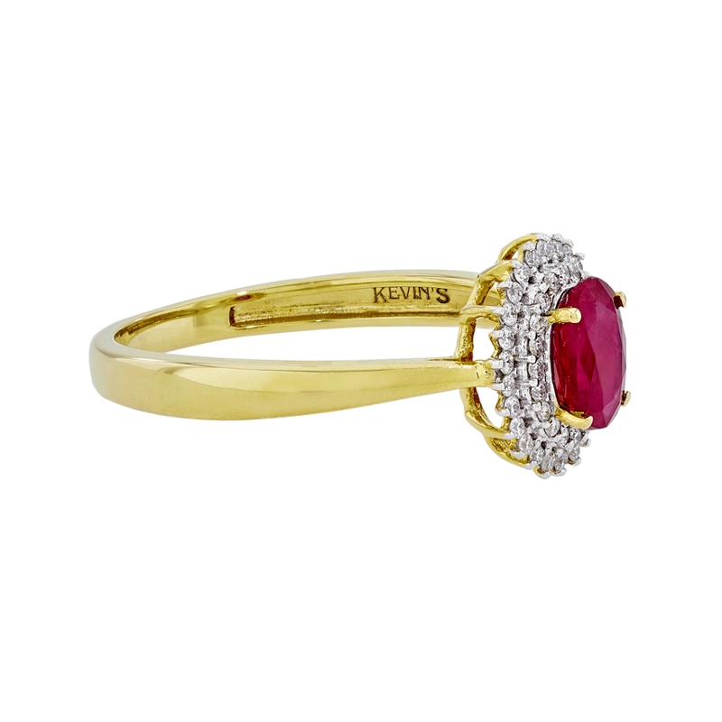 Anillo en oro amarillo de 18 Kilates, con rubí central de 0.60 Ct y decoración en diamantes de 0.12 Ct