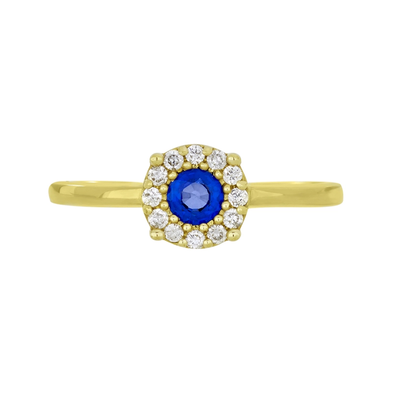 Anillo en oro amarillo de 18 Kilates, con zafiro central de 0.32 Ct y decoración en diamantes de 0.12 Ct