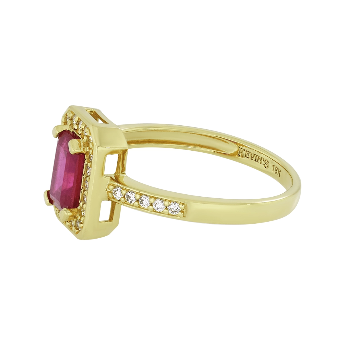 Anillo en oro amarillo de 18 Kilates, con rubí central de 0.60 Ct y decoración en diamantes de 0.15 Ct