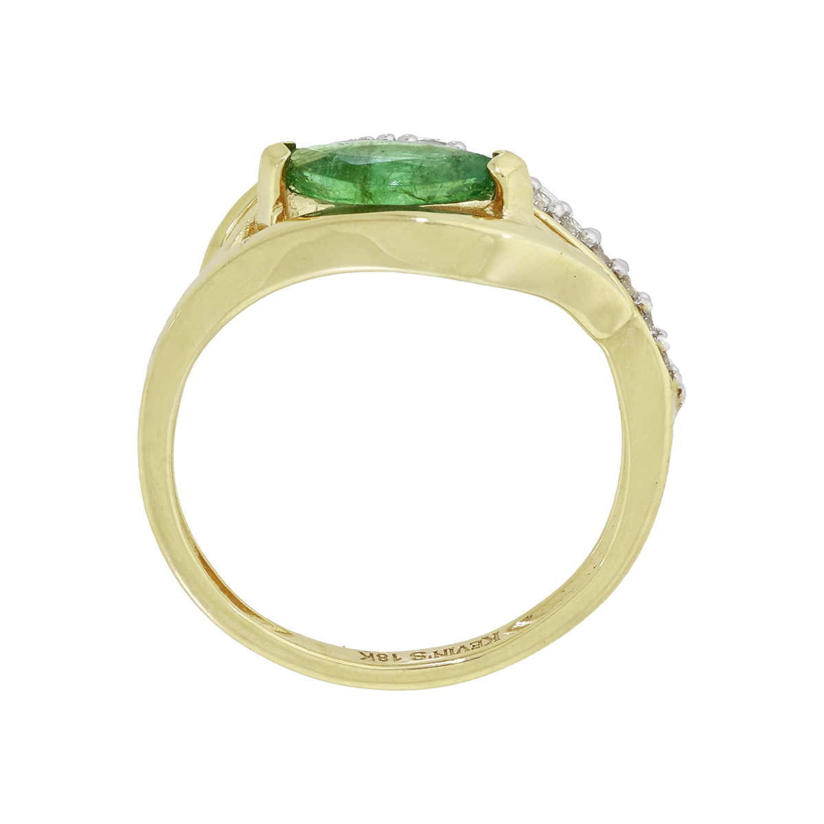 Anillo en oro amarillo de 18 Kilates, con esmeralda central de 0.50 Ct y decoración en diamantes de 0.08 Ct