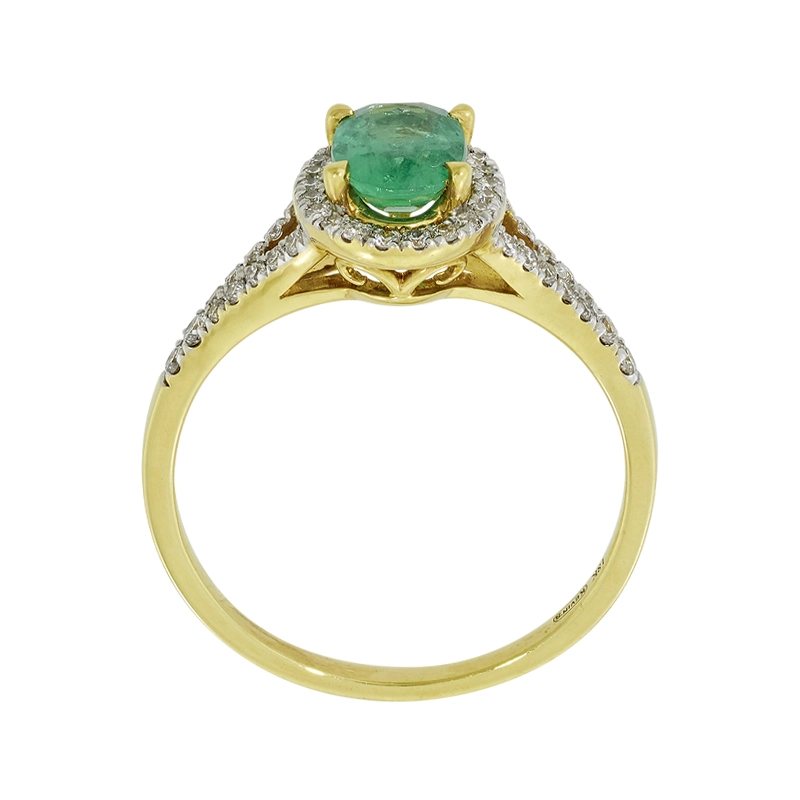 Anillo en oro amarillo de 18 Kilates, con esmeralda central de 0.65 Ct y decoración en diamantes de 0.25 Ct