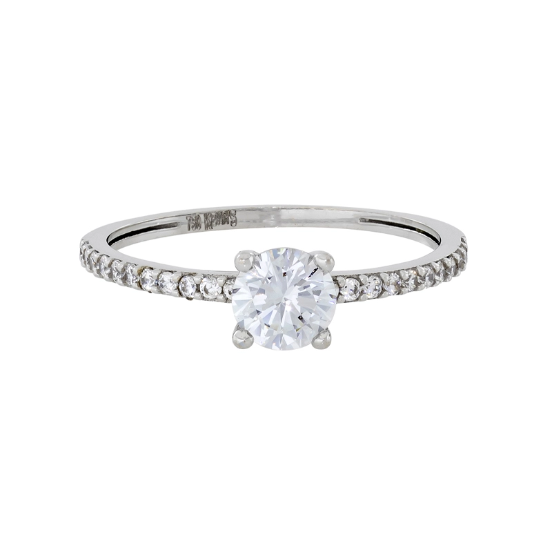 Anillo en oro blanco de 18 Kilates, con zircón central y decoración en zircones