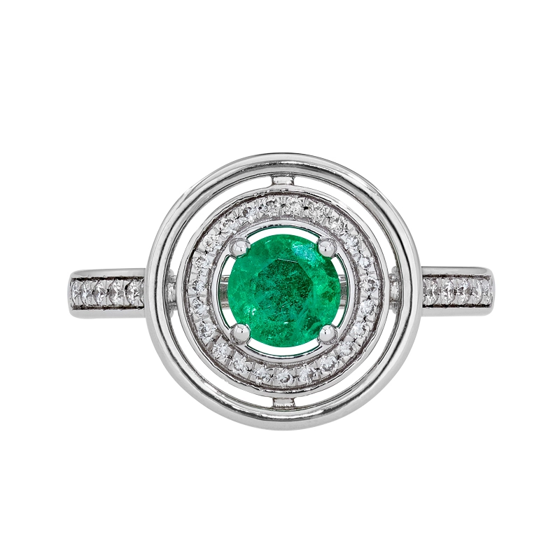 Anillo en oro blanco de 18 Kilates, con esmeralda central de 0.42 Ct y decoración en diamantes de 0.16 Ct