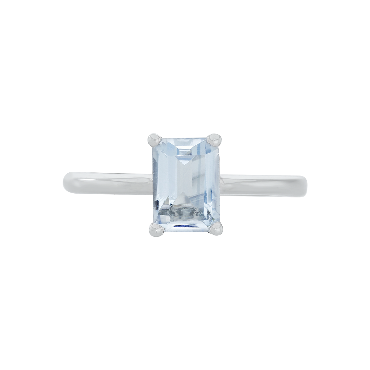 Anillo en oro blanco de 18 Kilates, con topacio central
