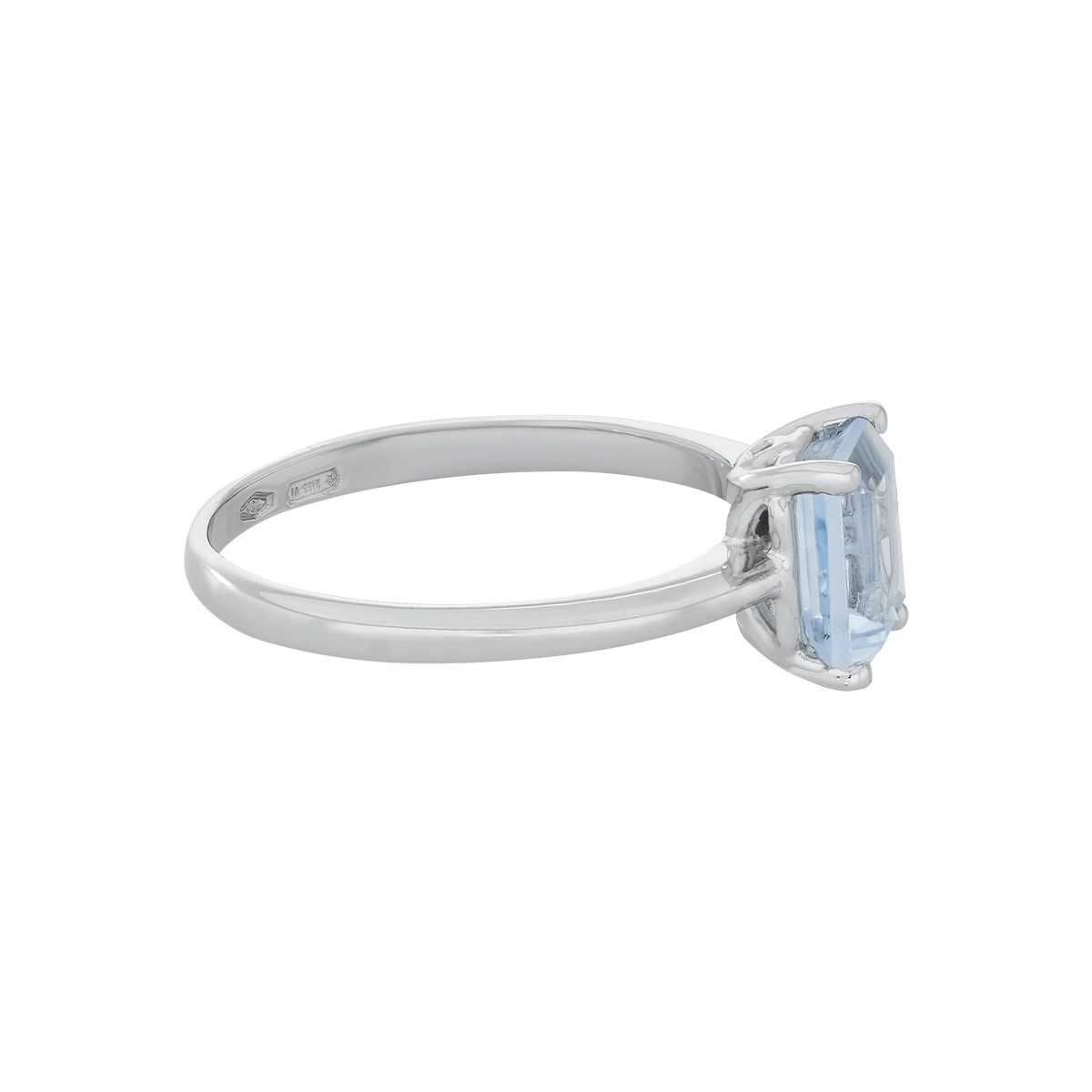 Anillo en oro blanco de 18 Kilates, con topacio central