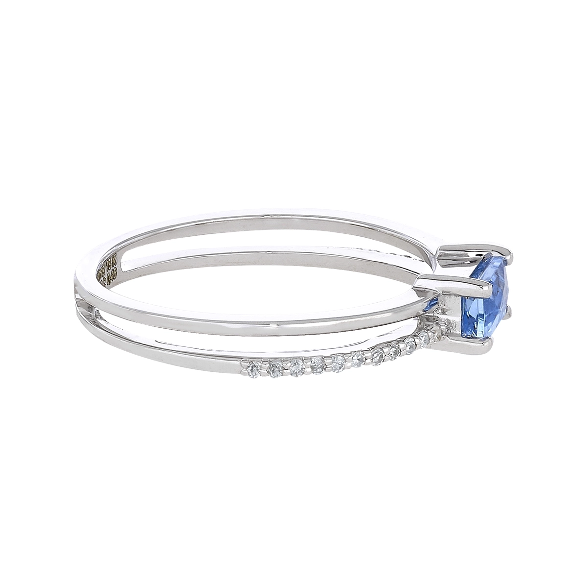 Anillo en oro blanco de 18 Kilates, con topacio central y decoración en diamantes de 0.07 Ct