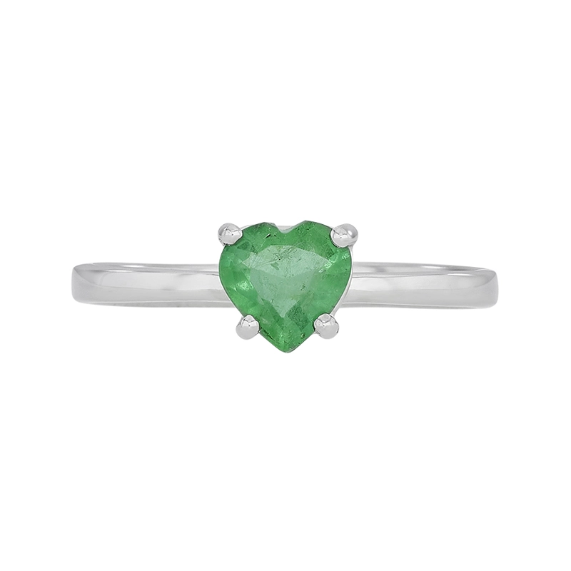 Anillo en oro blanco de 18 Kilates, con esmeralda central de 0.65 Ct